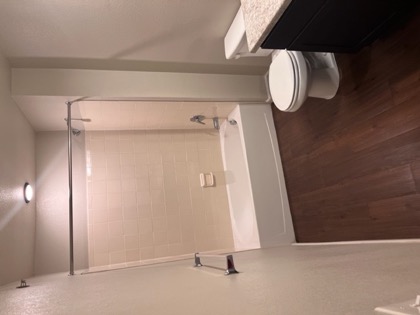 Bathroom with tub and vanity