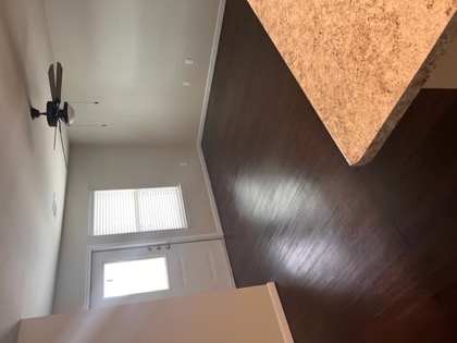 Open living area with vinyl plank flooring